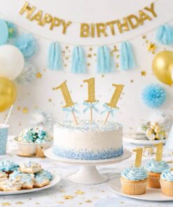 Kage og cupcakes pyntet med guld 1-tal og lyseblå sløjfer til 1 års fødselsdag for dreng