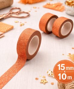 Orange glitter tape 15 mm x 10 m rullet ud på kreativ hobbyoverflade – dekorativ glimmertape til scrapbooking og DIY