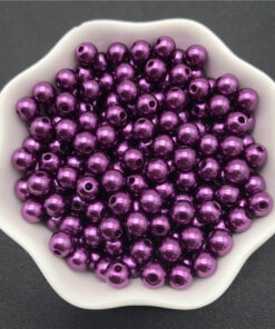Runde lilla voksperler