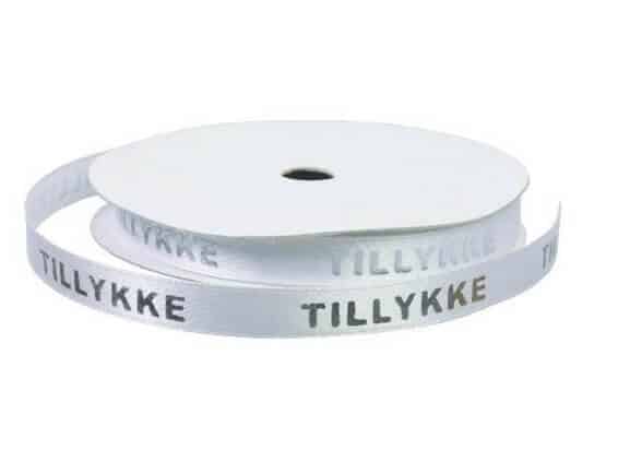 Satinbånd hvid 9 mm med "TILLYKKE"