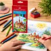 Barn tegner slot med Faber-Castell Slot farveblyanter i 12 farver ved skrivebord